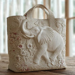 Quiltet mulepose med elefant
