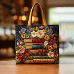 Quiltet tote bag med blomster- og bogtryk