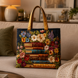 Vattert toteveske med blomster og bokmotiv