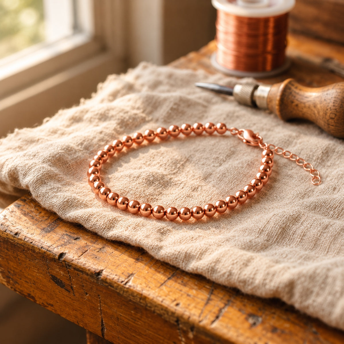 Veyra Bead Copper Anklet on linen
