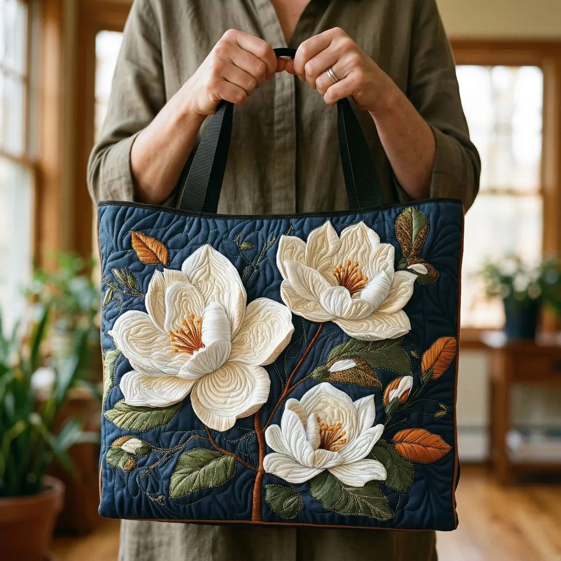 Quiltet mulepose med delikat Magnolia