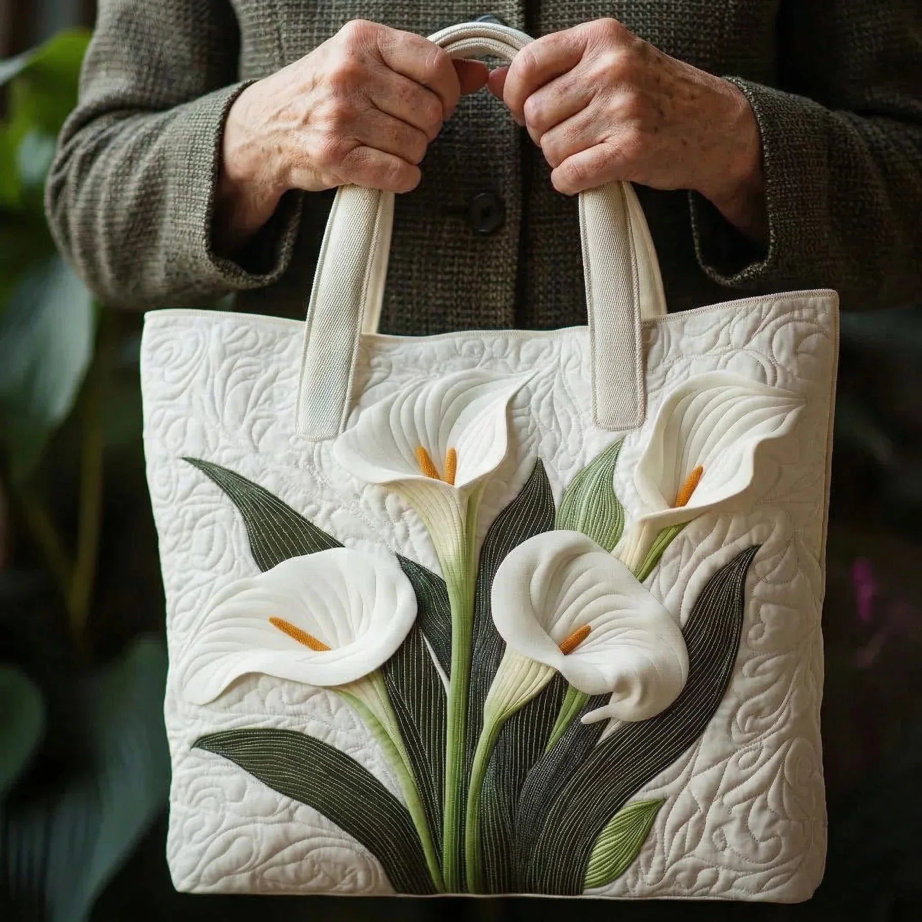 Quiltet mulepose med hvide Calla liljer